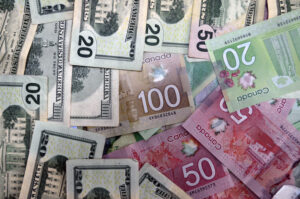 Picture of Canadian and Us Dollar bills