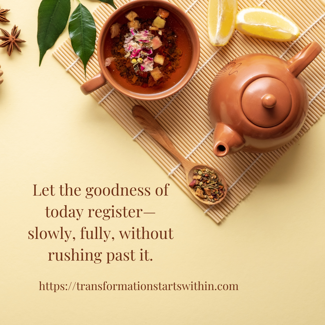 bamboo mat with teapot, sliced lemon, wooden spoon with dried tea leaves and cup of tea