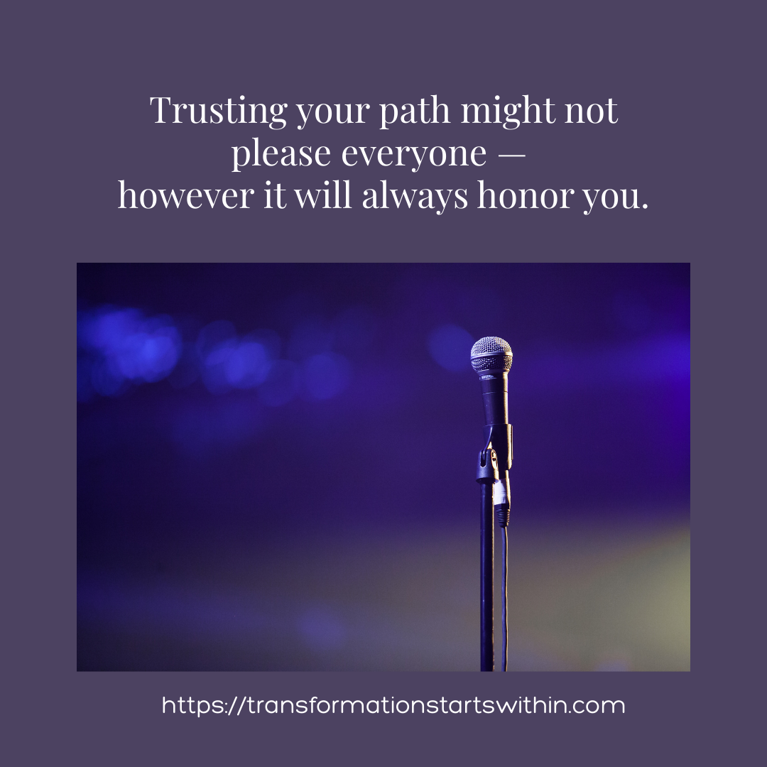 A microphone on stand lights blurred in the background