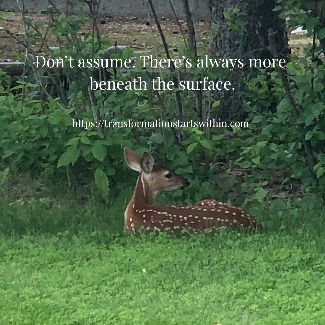 Cup of coffee on table, flowers, and background